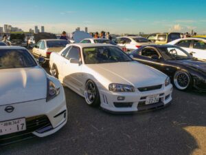 Exciting car meet featuring iconic sports cars, perfect for automotive enthusiasts.